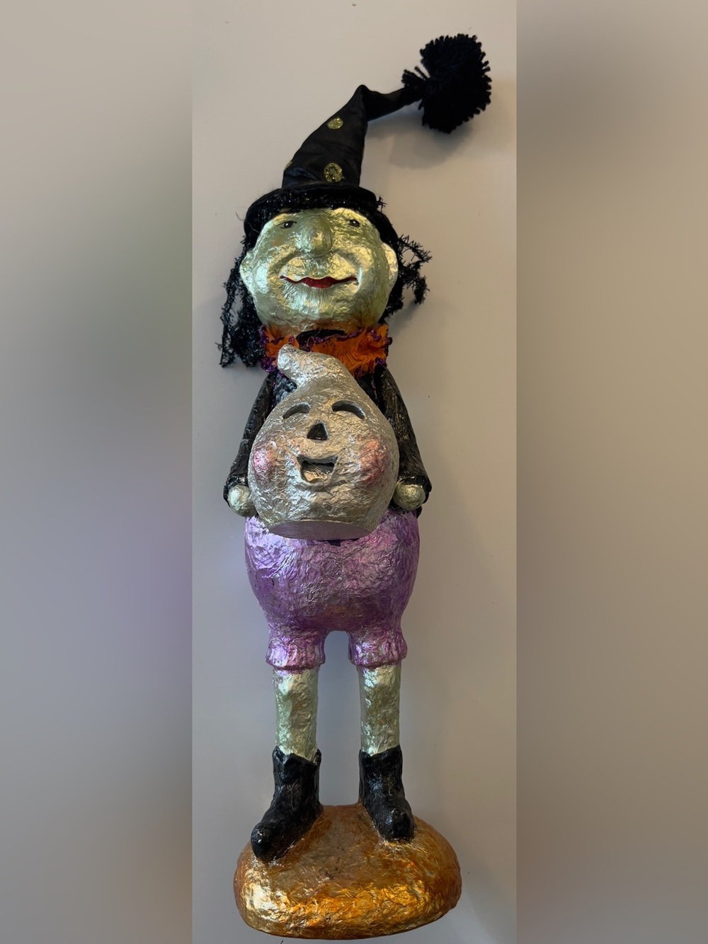 Vintage Halloween Figurine with a jack-o’-lantern